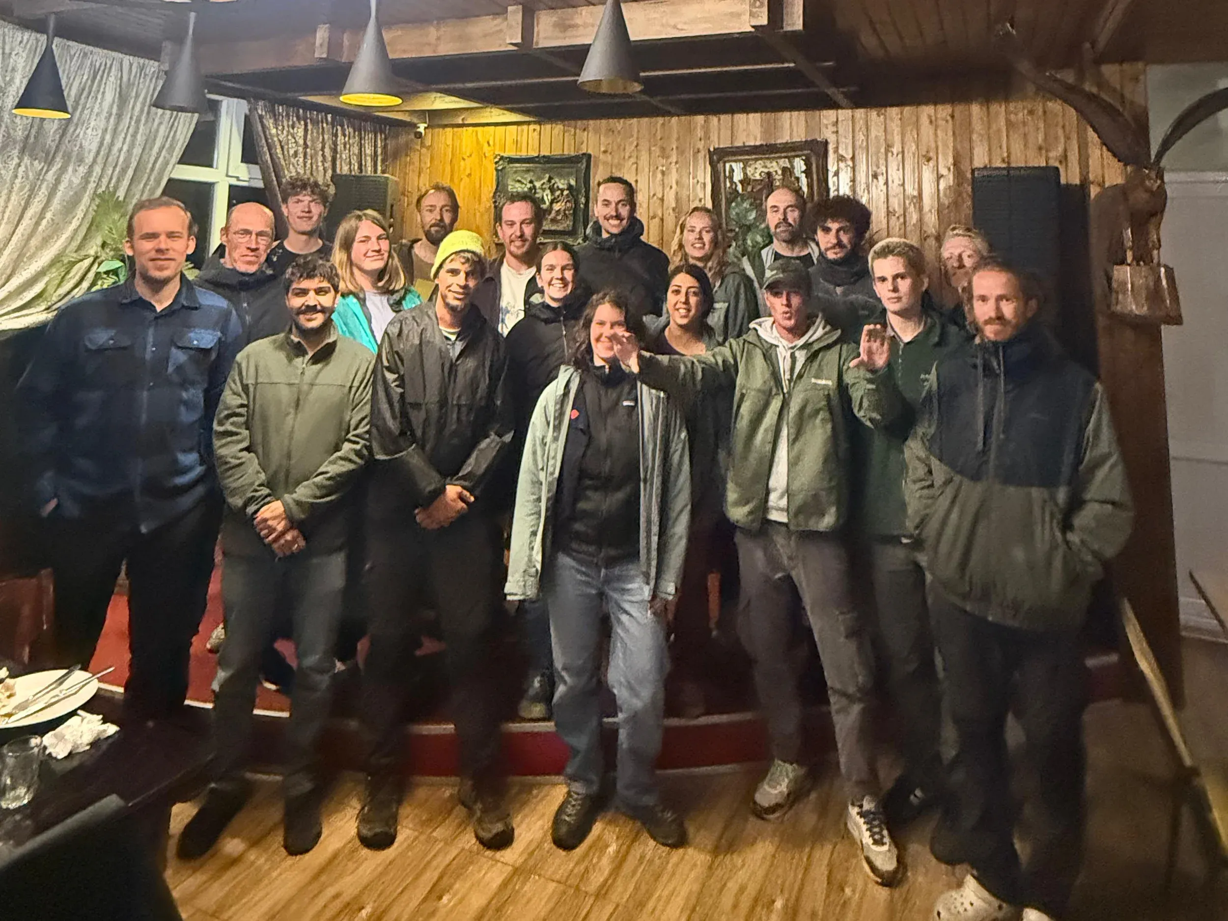 BRC volunteers gathered together for a group picture inside a restaurant.